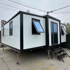 20ft white & Black Expandable Container Home With 3 wheel trailer