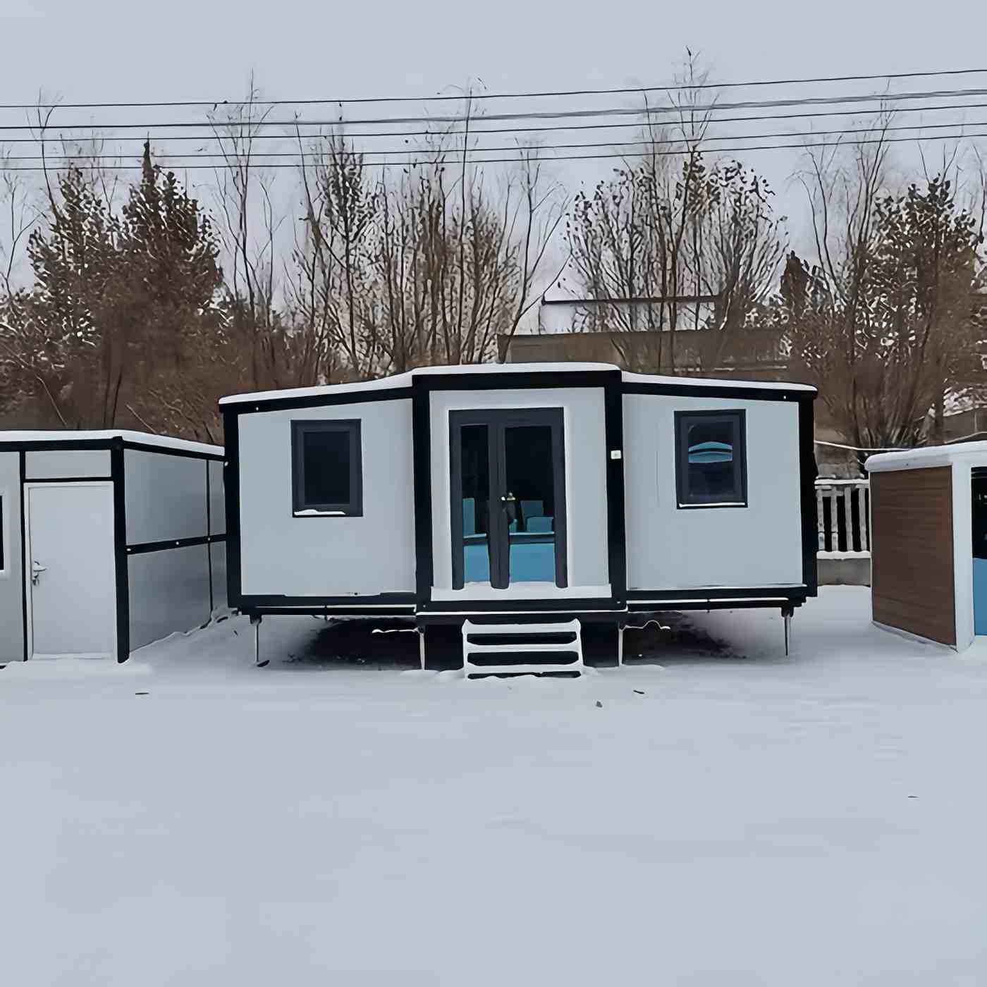 20ft white & Black Expandable Container Home With 3 wheel trailer