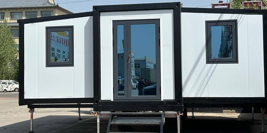 20ft white & Black Expandable Container Home With 3 wheel trailer