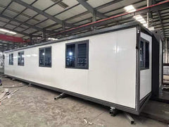 40FT White Expandable Container Prefabricated Home with one Living room and 3 Bedrooms.